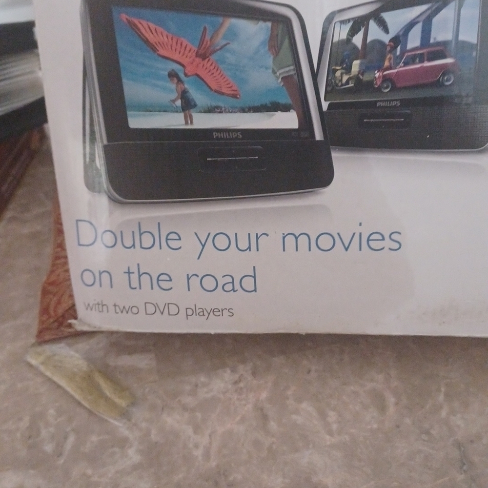 - Double your movies on the road with tow DVD - Picture 3 of 8